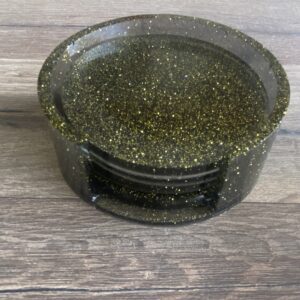 Dessous de verres noirs pailletés doré et support