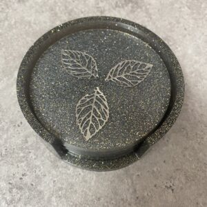 Dessous de verres gris noir pailletés feuilles d'argent et leur support